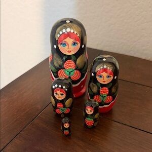 Russian Nesting Dolls with Red and Black Design